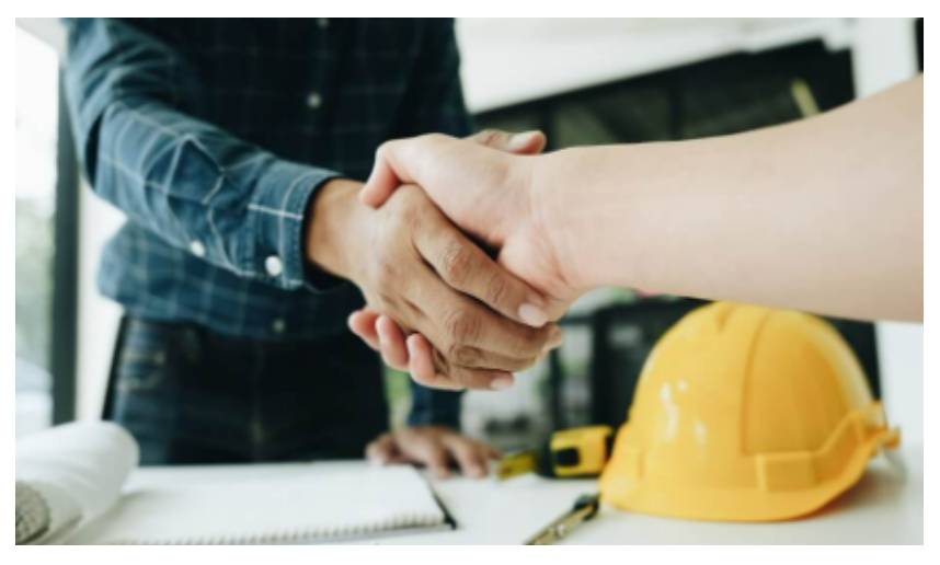 Photo of contractor and customer handshake.