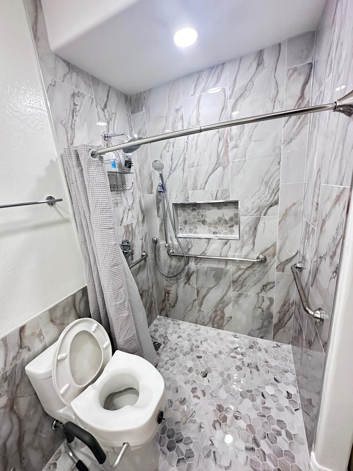 Photo of Aqua Therapy Mother-In-Law Suite bathroom remodel.